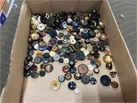 flat of several hundred loose whistles