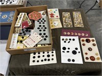 large lot of buttons on small cards,