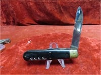 Antique pocket knife w/corkscrew.