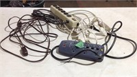 Assorted power strips and extension cords