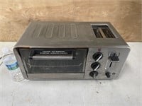 Large toaster oven with toaster slots