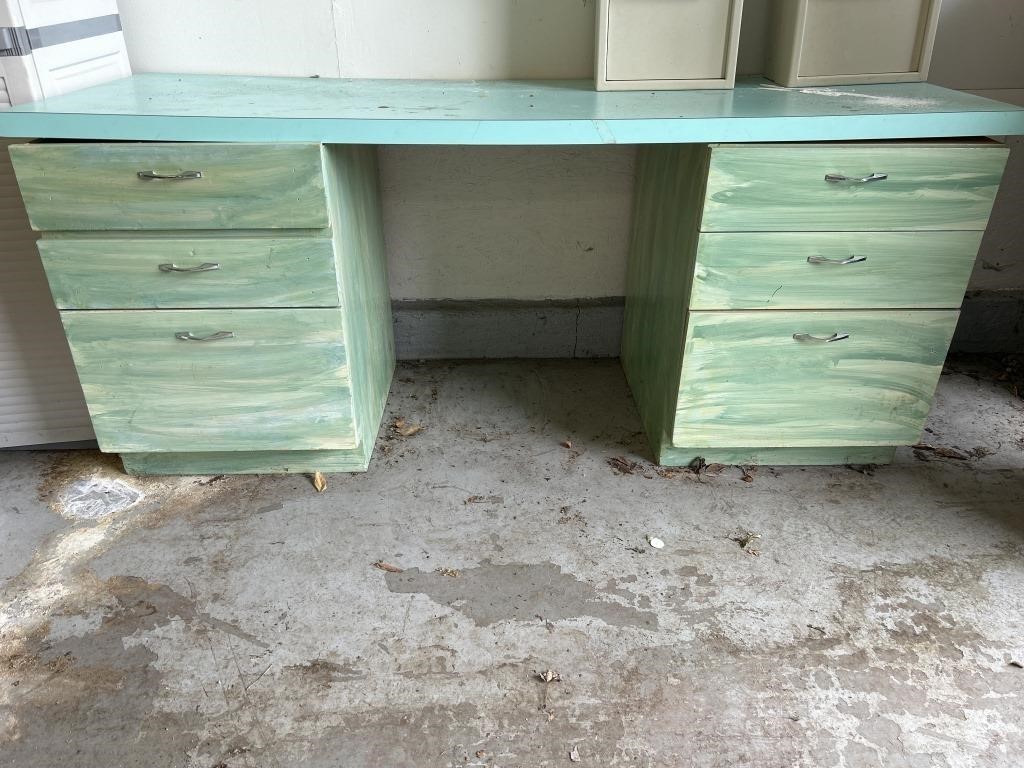 2 wooden cabinets with countertop “desk”