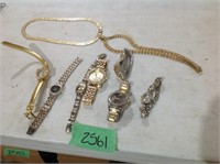Gold watches and necklaces