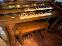 Lowrey Genie 44 Organ with stool. Organ is on