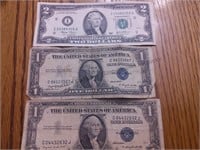 Two silver certificates and a $2 bill for one