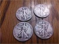 Four walking liberty half dollars from the 1930s