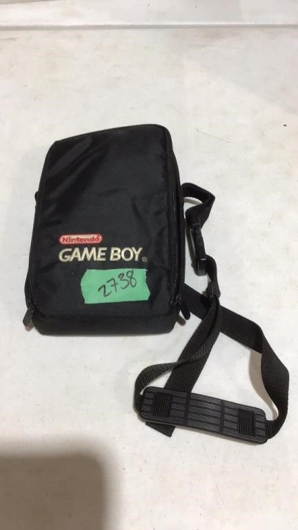 Game boy in bag.
