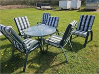 Glass top patio table and 6 chairs 42"28" like