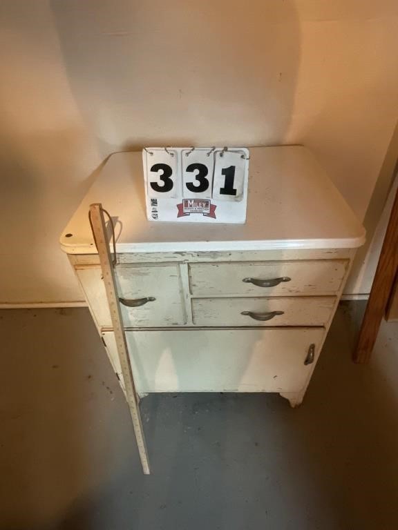 Vintage wood storage cabinet with porcelain top