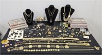 TABLE OF ASSORTED COSTUME JEWELRY