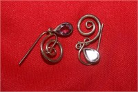 A Pair of Sterling Earrings
