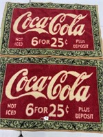 2 Coke floor mats
