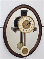 JUNGHANS CLOCK MOUNTED ON A MIRROR - WORKS