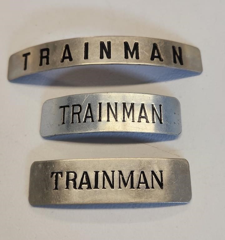 Three Trainman Railroad Cap Badges