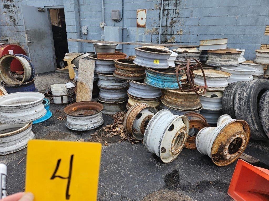 LARGE GROUP OF RIMS, MOSTLY STEEL. NO TIRES ARE