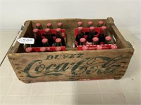 24 Coke bottles in Coke case 1999 Hockey game