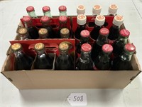 24 Coke bottles