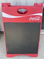 Coke side walk sign