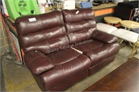 leather love seat USED/DAMAGED (lobby)