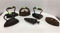 5 Antique Cast Irons & Iron Stand