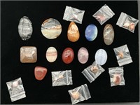 Lot of cut and polished stones as pictured