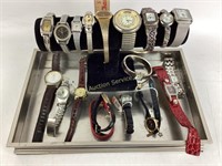 wrist watches In silver tray