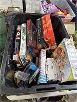 BIN WITH MISC GAMES TOYS