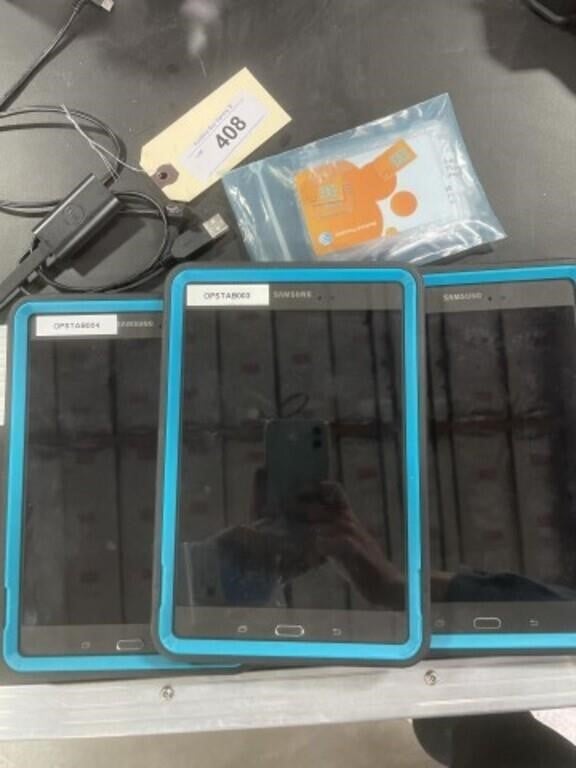 Three Samsung tablets and SD cards