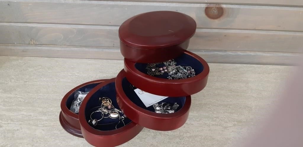 Tiered swivel Jewelry box with contents