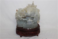 A Chinese Agate Figure on Stand