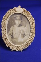 A Carved Chinese Export Bone Picture Frame