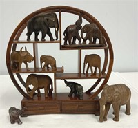Wooden Shelf with Carved Animals