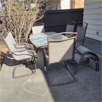 O406 Patio table Six chairs and two ottomans