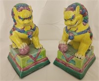 Pair of antique porcelain foo dog statues