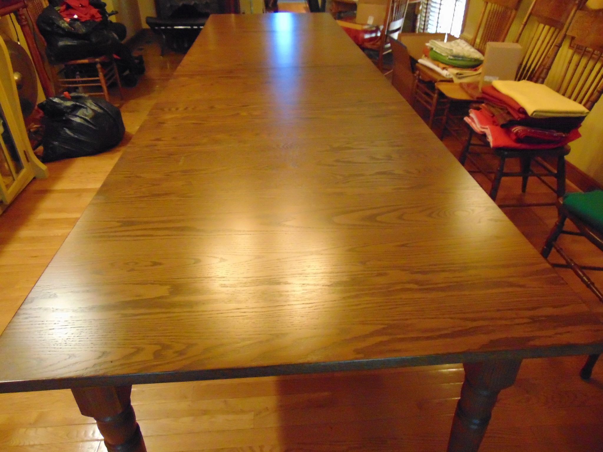16 Ft Long Wood Dining Room Table. Table has 4 12"