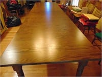 16 Ft Long Wood Dining Room Table. Table has 4 12"