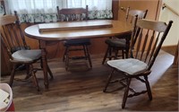 SOLID WOOD HEAVY OVAL DINING TABLE AND 4 CHAIRS