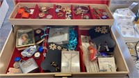 Jewelry box full of earrings, watch, religious