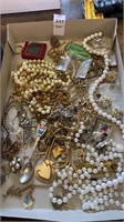 Souvenir spoon, earrings, beads, pins, key chains