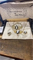 Cameo style bracelet, necklace and clip earrings