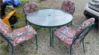 Metal patio set with glass top table, 4 chairs
