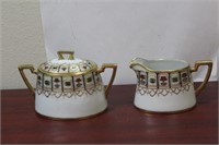 An Antique Nippon Creamer and Sugar Container