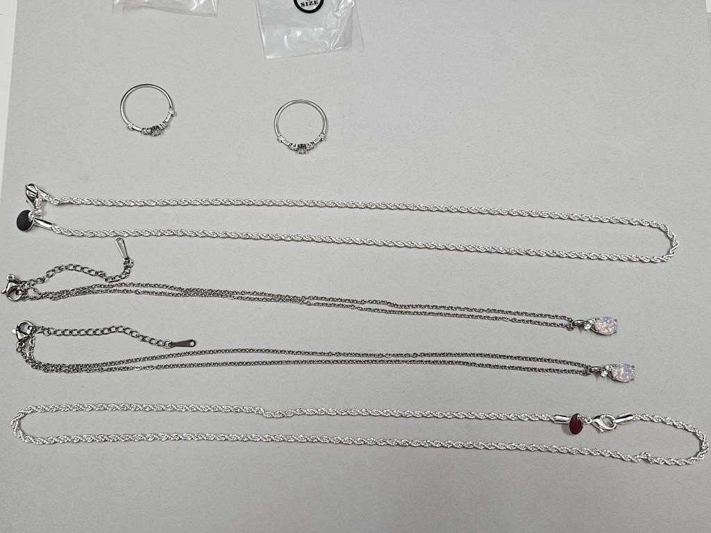 4 Silver Necklaces,2 Rings