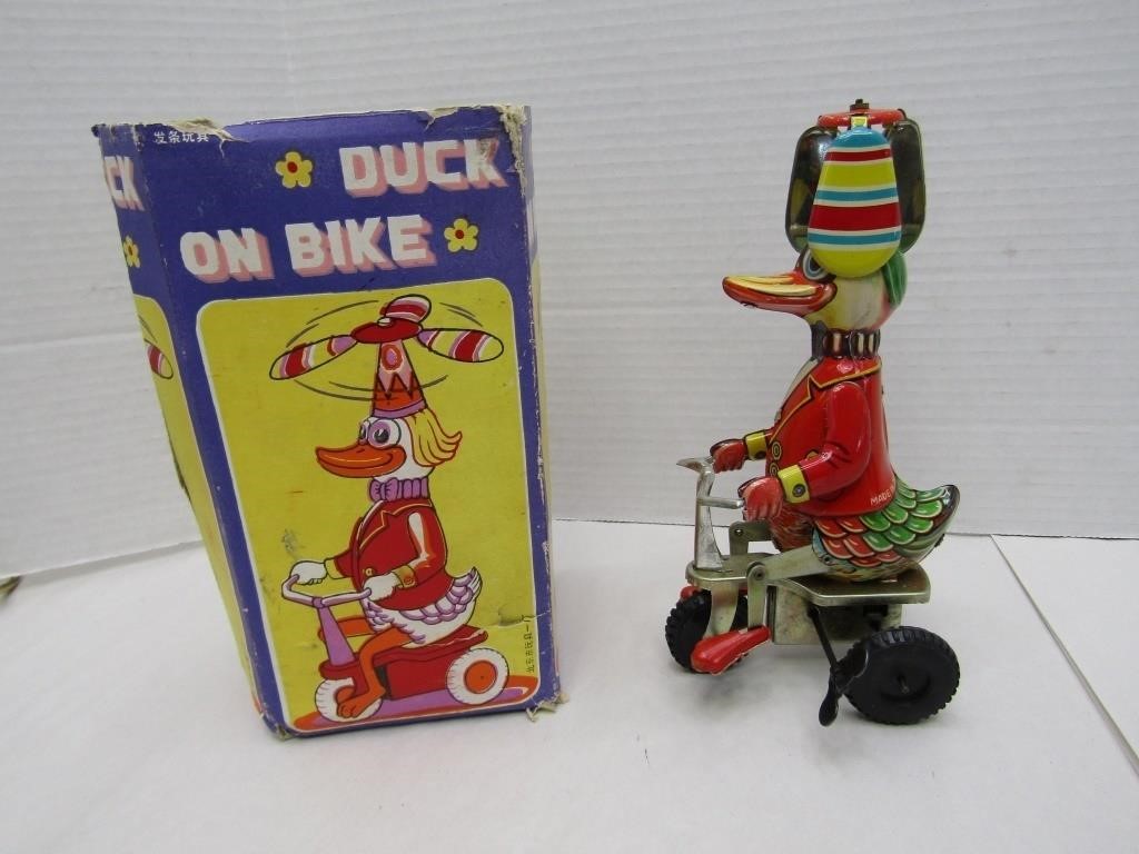 Vintage +Toy Duck On Bike