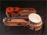 Koawood ukulele with crack and trim damage,