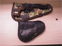 Crosman .357 air pistol with soft camo case and a