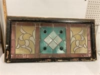 Stained glass window. Green gems.No visible cracks