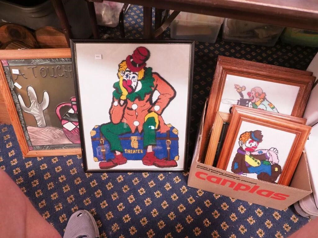 Artwork including framed hooked clowns