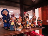 11 clown figurines: one is a music box with