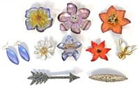 Lot: Alexis Bittar Brooches (9) and Earrings (1).